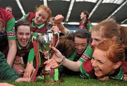6 March 2011; The Eoghan Rua players celebrate with the Agnes O'Farrelly cup. All-Ireland Intermediate Camogie Club Championship Final, Eoghan Rua v The Harps, Croke Park, Dublin. Picture credit: Brian Lawless / SPORTSFILE