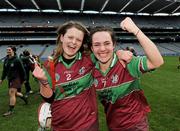 6 March 2011; Eoghan Rua players Adelle Archibald, left, and Maria Mooney celebrate after the match. All-Ireland Intermediate Camogie Club Championship Final, Eoghan Rua v The Harps, Croke Park, Dublin. Picture credit: Brian Lawless / SPORTSFILE
