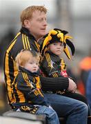 6 March 2011; Kilkenny supporters Cody, age 2, and Alanna, age 4, with their father Andy O'Neill watch on during the game. Allianz Hurling League Division 1 Round 3, Kilkenny v Wexford, Nowlan Park, Kilkenny. Picture credit: Stephen McCarthy / SPORTSFILE