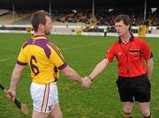 6 March 2011; Referee Tony Carroll, Offaly, shakes hands with Wexford captain Darren Stamp. Allianz Hurling League Division 1 Round 3, Kilkenny v Wexford, Nowlan Park, Kilkenny. Picture credit: Stephen McCarthy / SPORTSFILE