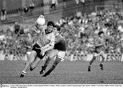 31 July 1988; Mick Galvin, Dublin, in action against Robbie O'Malley, Meath. Leinster Football Championship Final, Meath v Dublin, Croke Park, Dublin. Picture credit: Ray McManus / SPORTSFILE