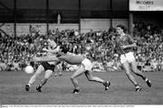 31 July 1988; Barney Rock, Dublin, in action against Mick Lyons and Robbie O'Malley, right, Meath. Leinster Football Championship Final, Meath v Dublin, Croke Park, Dublin. Picture credit: Ray McManus / SPORTSFILE