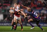 22 October 2016; Stuart Olding of Ulster is tackled by Henry Slade, left, and Olly Woodburn of Exeter Chiefs  during the European Rugby Champions Cup Pool 5 Round 2 match between Ulster and Exeter Chiefs at the Kingspan Stadium in Belfast. Photo by Ramsey Cardy/Sportsfile