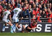 22 October 2016; Rory Scannell of Munster scores his side's fifth try despite the efforts of Ali Price of Glasgow Warriors during the European Rugby Champions Cup Pool 1 Round 2 match between Munster and Glasgow Warriors at Thomond Park in Limerick. Photo by Diarmuid Greene/Sportsfile