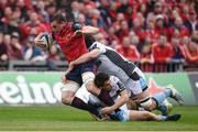 22 October 2016; Tommy O'Donnell of Munster is tackled by Sam Johnson and Tim Swinson of Glasgow Warriors during the European Rugby Champions Cup Pool 1 Round 2 match between Munster and Glasgow Warriors at Thomond Park in Limerick. Photo by Diarmuid Greene/Sportsfile