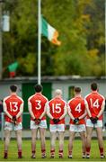 23 October 2016; Padraig Pearses players face the Tricolour during the National Anthem ahead of the Roscommon County Senior Club Football Championship Final game between St Brigid's and Padraig Pearses in Kiltoom, Roscommon. Photo by Seb Daly/Sportsfile