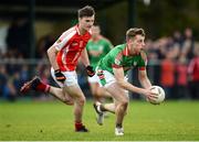 23 October 2016; Niall McInerney of St Brigid’s in action against Hubert Darcy of Padraig Pearses during the Roscommon County Senior Club Football Championship Final game between St Brigid's and Padraig Pearses in Kiltoom, Roscommon. Photo by Seb Daly/Sportsfile