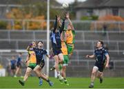 23 October 2016; Gavin Duffy of Salthill-Knocknacarra in action against Cathal Silke, left, and Ronan Steede of Corofin during the Galway County Senior Club Football Championship Final match between Corofin and Salthill-Knocknacarra at Pearse Stadium in Galway. Photo by Ramsey Cardy/Sportsfile