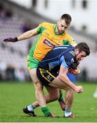 23 October 2016; Tadhg Haran of Salthill-Knocknacarra is tackled by Cathal Silke of Corofin during the Galway County Senior Club Football Championship Final match between Corofin and Salthill-Knocknacarra at Pearse Stadium in Galway. Photo by Ramsey Cardy/Sportsfile