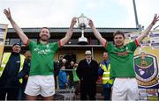 23 October 2016; Captains Darragh Donnelly, left, and Cathal McHugh of St Brigid’s lift the trophy following their side's victory during the Roscommon County Senior Club Football Championship Final game between St Brigid's and Padraig Pearses in Kiltoom, Roscommon. Photo by Seb Daly/Sportsfile