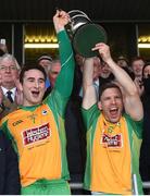 23 October 2016; Corofin's Alan Burke, left, and Ciaran McGrath of Corofin lift the cup following their victory in the Galway County Senior Club Football Championship Final match between Corofin and Salthill-Knocknacarra at Pearse Stadium in Galway. Photo by Ramsey Cardy/Sportsfile