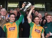 23 October 2016; Corofin's Alan Burke, left, and Ciaran McGrath of Corofin lift the cup following their victory in the Galway County Senior Club Football Championship Final match between Corofin and Salthill-Knocknacarra at Pearse Stadium in Galway. Photo by Ramsey Cardy/Sportsfile