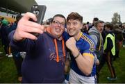 23 October 2016; Joseph O'Connor of St Rynagh's celebrates with a supporter following the Offaly County Senior Club Hurling Championship Final game between St Rynagh's and Birr at O'Connor Park in Tullamore, Co Offaly. Photo by Cody Glenn/Sportsfile