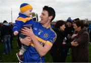 23 October 2016; Aidan Treacy of St Rynagh's celebrates with his nephey Sean Leonard, age 1, following the Offaly County Senior Club Hurling Championship Final game between St Rynagh's and Birr at O'Connor Park in Tullamore, Co Offaly. Photo by Cody Glenn/Sportsfile