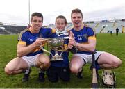 23 October 2016; Thomas O'Brien and Kevin O'Brien of Patrickswell, along with James Fitzgerald, aged 12, celebrate with the cup after the Limerick County Senior Club Hurling Championship Final between Ballybrown and Patrickswell at the Gaelic Grounds in Limerick. Photo by Diarmuid Greene/Sportsfile