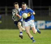 9 March 2011; Peter Acheson, Tipperary, in action against Tadhg Houlihan, Waterford. Cadbury Munster GAA Football Under 21 Championship Quarter-Final, Waterford v Tipperary, Fraher Field, Dungarvan, Co. Waterford. Picture credit: Diarmuid Greene / SPORTSFILE