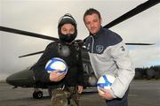 10 March 2011; Sgt. Ray Hennessy from the Irish Defence Forces Parachuting Team – the Black Knights with player Gary Messett at the launch of the Cerebral Palsy St. Patricks Tournament. The Irish Paralympic football team will be competing in the FAI St Patricks Cup from March 16th – 20th in Dublin. Ireland will be playing against England, Scotland and Holland. A mouth watering international match will take place on St Patricks Day when Ireland take on England at St. Francis FC in Baldonnell. On Sunday March 20th the black knights which are the Irish Defence Forces Parachute Team will be parachuting the final match ball in from 12,000 feet above the Tallaght stadium. Baldonnell Aerodrome, Dublin. Photo by Sportsfile