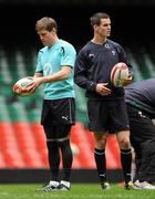 11 March 2011; Ireland's Ronan O'Gara, left, and Jonathan Sexton during the squad captain's run ahead of their RBS Six Nations Rugby Championship match against Wales on Saturday. Ireland Rugby Squad Captain's Run, Millennium Stadium, Cardiff, Wales. Picture credit: Barry Cregg / SPORTSFILE