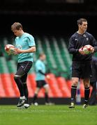 11 March 2011; Ireland's Ronan O'Gara, left, and Jonathan Sexton during the squad captain's run ahead of their RBS Six Nations Rugby Championship match against Wales on Saturday. Ireland Rugby Squad Captain's Run, Millennium Stadium, Cardiff, Wales. Picture credit: Barry Cregg / SPORTSFILE