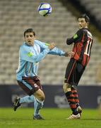 11 March 2011; Killian Brennan, Bohemians, in action against John Lester, Drogheda United. Airtricity League Premier Division, Bohemians v Drogheda United, Dalymount Park, Dublin. Photo by Sportsfile