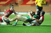 11 March 2011; David Doyle, Ireland, is tackled by Harry Robinson, left, and Matthew Morgan, Wales. U20 Six Nations Rugby Championship, Wales v Ireland, Parc y Scarlets, Llanelli, Carmarthenshire, Wales. Picture credit: Barry Cregg / SPORTSFILE