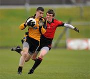 12 March 2011; Ciaran Fitzsimons, St Pat's Navan, is tackled by Kieran Lenehan, Dundalk Colleges. Leinster Colleges Senior Football 'A' Championship Final, St Pat's Navan v Dundalk Colleges, Paric Tailteann, Navan, Co. Meath. Picture credit: Ray McManus / SPORTSFILE