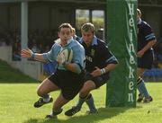 27 October 2001; Byran Shelbourne of Galwegians in action against Brian O'Riordan of UCD during the AIB League Division 1 match between UCD and Galwegians at Belfield Bowl in Dublin. Photo by Ray McManus/Sportsfile