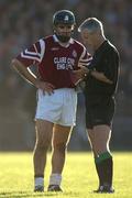 28 October 2001; Noel Brodie of St Joseph's Doora Barefield is booked by referee Pat O'Connor during the AIB Munster Senior Club Hurling Championship Quarter-Final match between Ballygunner and St Joseph's Doora Barefield at Walsh Park in Waterford. Photo by Ray McManus/Sportsfile
