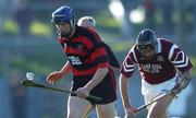 28 October 2001; Andy Moloney of Ballygunner races clear of Sean McMahon of St Joseph's Doora Barefield during the AIB Munster Senior Club Hurling Championship Quarter-Final match between Ballygunner and St Joseph's Doora Barefield at Walsh Park in Waterford. Photo by Ray McManus/Sportsfile
