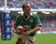 13 October 2001; Denis Hickie of Ireland celebrates scoring his sides first try against Wales during the Lloyds TSB Six Nations Championship match between Wales and Ireland at the Millennium Stadium in Cardiff, Wales. Photo by Matt Browne/Sportsfile