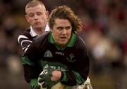 27 October 2001; Alan Cronin of Nemo Rangers is tackled by Declan Griffin of Doonbeg during the AIB Munster Senior Club Football Championship Quarter-Final match between Nemo Rangers and Doonbeg at Páirc Uí Rinn in Cork. Photo by Brendan Moran/Sportsfile