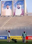 30 October 2001; Local Groundsmen attend to the pitch at the Al-Nahyan Stadium ahead of the the 2002 FIFA World Cup AFC Qualification Play-Off 2nd Leg match between United Arab Emirates and Iran the at Al-Nahyan Stadium in Abu Dhabi, United Arab Emirates. Photo by David Maher/Sportsfile