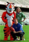 31 October 2001; The Irish Rugby Football Union and Kellogg's Frosties have teamed up to launch Frosties Youth Development Programme, a new and exciting partnership aimed at introducing new recruits to the game. The project imbraces the involvement of 76 employed Youth Development Officers liasing with a potential 430 schools around Ireland in a 26 week programme, from Sept to Easter, with the aim of introducing to the game of rugby, schoolchildren from the age group of under 8's to 15 years. Pictured at the launch are Leinster and Ireland wing Denis Hickie, model Kelly O'Byrne and Tony the Tiger. Photo by Brendan Moran/Sportsfile