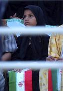 31 October 2001; A young Iranian fan watches from the stands during the 2002 FIFA World Cup AFC Qualification Play-Off 2nd Leg match between United Arab Emirates and Iran the at Al-Nahyan Stadium in Abu Dhabi, United Arab Emirates. Photo by David Maher/Sportsfile