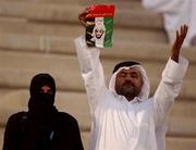 31 October 2001; A United Arab Emirates supporter shows his support for his team along with his wife ahead of the 2002 FIFA World Cup AFC Qualification Play-Off 2nd Leg match between United Arab Emirates and Iran the at Al-Nahyan Stadium in Abu Dhabi, United Arab Emirates. Photo by David Maher/Sportsfile