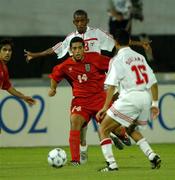 31 October 2001; Mujahed Khaziravi of Iran in action against Mohammed Qassim Juma of United Arab Emirates during the 2002 FIFA World Cup AFC Qualification Play-Off 2nd Leg match between United Arab Emirates and Iran the at Al-Nahyan Stadium in Abu Dhabi, United Arab Emirates. Photo by David Maher/Sportsfile