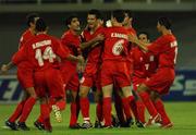 31 October 2001; Ali Daei of Iran, centre, celebrates with team-mates after scoring his side's first goal during the 2002 FIFA World Cup AFC Qualification Play-Off 2nd Leg match between United Arab Emirates and Iran the at Al-Nahyan Stadium in Abu Dhabi, United Arab Emirates. Photo by David Maher/Sportsfile