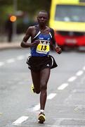 29 October 2001; Elijah Mutai Chemwolo, Kenya, in action during the adidas Dublin Marathon in Dublin. Photo by Ray McManus/Sportsfile