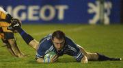 2 November 2001; Eric Miller of Leinster goes to score a try despite the tackle of Ben Breeze of Newport during the Heineken Cup Pool 6 Round 4 match between Newport and Leinster at Rodney Parade in Newport, Wales. Photo by Matt Browne/Sportsfile