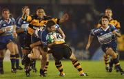 2 November 2001; Peter McKenna of Leinster is tackled by Shane Howarth, 10, and Ofisa Tonu'u, both of Newport, during the Heineken Cup Pool 6 Round 4 match between Newport and Leinster at Rodney Parade in Newport, Wales. Photo by Matt Browne/Sportsfile