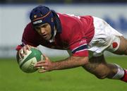 3 November 2001; Mike Mullins of Munster scores his side's fifth try during the Heineken Cup Pool 4 Round 4 match between Munster and Bridgend at Musgrave Park in Cork. Photo by Brendan Moran/Sportsfile