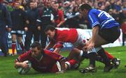 3 November 2001; Jason Holland of Munster, scores his side's fourth try during the Heineken Cup Pool 4 Round 4 match between Munster and Bridgend at Musgrave Park in Cork. Photo by Ray McManus/Sportsfile