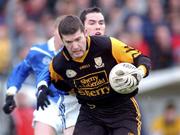 4 November 2001; Niall Kelly of Dunshaughlin is tackled by Martin Mulvaney of Skryne during the Meath County Football Final match between Dunshaughlin and Skryne at Pairc Tailteann in Navan, Meath. Photo by Aofie Rice/Sportsfile