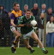 4 November 2001; Richard Haran of Charlestown Sarsfields in action against Paul Noone of Roscommon Gaels during the AIB Connacht Club Senior Football Championship Semi-final match between Charlestown Sarsfields and Roscommon Gaels at Fr O'Hara Memorial Park in Charlestown, Mayo. Photo by Ray McManus/Sportsfile