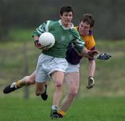 4 November 2001; Aidan Higgins of Charlestown Sarsfields in action against Alan Nolan of Roscommon Gaels during the AIB Connacht Club Senior Football Championship Semi-final match between Charlestown Sarsfields and Roscommon Gaels at Fr O'Hara Memorial Park in Charlestown, Mayo. Photo by Ray McManus/Sportsfile