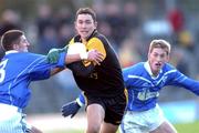4 November 2001; Trevor Dowd of Dunshaughlin is tackled by Mark Harrington of Skryne during the Meath County Football Final match between Dunshaughlin and Skryne at Pairc Tailteann in Navan, Meath. Photo by Aofie Rice/Sportsfile
