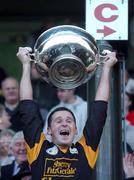 4 November 2001; Dunshaughlin Captain Ciaran Byrne lifts the cup after winning the Meath County Football Final match between Dunshaughlin and Skryne at Pairc Tailteann in Navan, Meath. Photo by Aofie Rice/Sportsfile