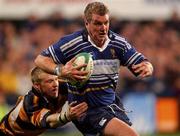 26 October 2001; Victor Costello of Leinster is tackled by Andrew Powell of Newport during the Heineken Cup Pool 6 Round 3 match between Leinster and Newport at Donnybrook Stadium in Dublin. Photo by Brian Lawless/Sportsfile