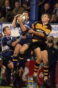 26 October 2001; Peter McKenna of Leinster fields a high ball while being tackled by Matt Mostyn of Newport during the Heineken Cup Pool 6 Round 3 match between Leinster and Newport at Donnybrook Stadium in Dublin. Photo by Brendan Moran/Sportsfile