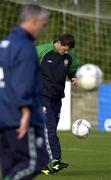 8 November 2001; Roy Keane practices some ball skills, under the watchful eye of manager Mick McCarthy during a Republic of Ireland Squad Training Session at John Hyland Park in Baldonnell, Dublin, ahead of the World Cup Play-off with Iran. Photo by Brendan Moran/Sportsfile